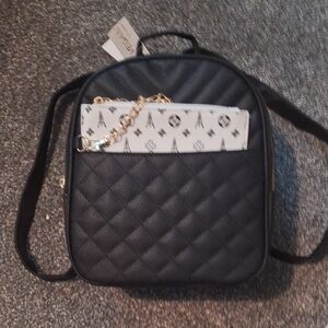 Black and White Quilted Backpack with Structured Design